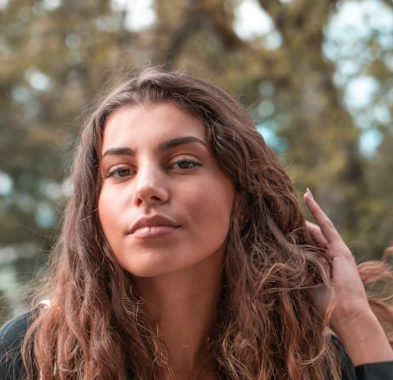 Woman touching her hair